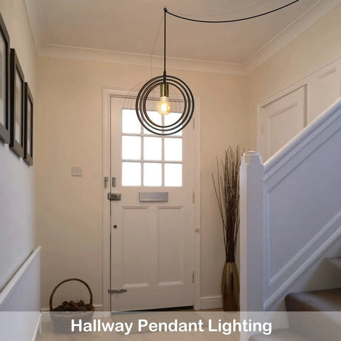 Plug In Industrial Pendant Light With Rotatable Cage in hallway, black and gold style metal fixture, E26 base, entryway use.
