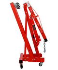 2 Ton Folding Engine Hoist With Heavy Duty Steel Frame And Rollin Smooth Casters Adjustable Boom For Quick Engine Swaps Powder Coated Red Built Tough Shop Tool side view with lifting arms.
