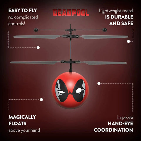 Red World Tech Toys Deadpool Motion Sensing Flying Ball And Helicopter Toy with blades extended displaying Deadpool face.