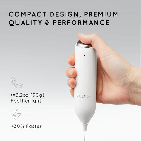 Hand holding Rechargeable Milk Frother Handheld With USB C Charging Stand 2 In 1 Wall Mount And Counter Stand Electric Whisk For Coffee Matcha Lattes And More Mini Foam Maker