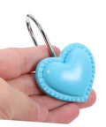 Close-up of a blue heart pendant from the Heart Pendant Shower Curtain Hooks 12 Piece Set Retro Resin Rod Hangers.