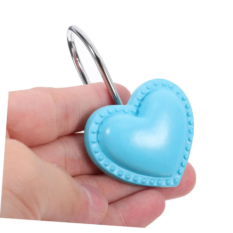 Close-up of a blue heart pendant from the Heart Pendant Shower Curtain Hooks 12 Piece Set Retro Resin Rod Hangers.