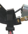 Close-up of GM Ignition Distributor Wiring Harness 19207437, showing connectors and metal contact for GM vehicles.