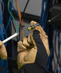 Hands holding Universal BNC Compression Coax Connector for RG6 and RG6 quad shield cables with viewing window for installation.