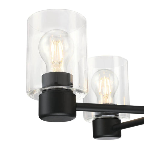 Close-up of clear glass shades on Five Light Indoor Chandelier in Matte Black Finish With Clear Glass Cool Modern Vibe For Dining Rooms And Foyers Sloped Ceiling Ready Includes 36 Inch Chain And Easy Mounting