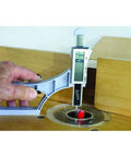 Straight Shooter Magnetic Height Gauge For Woodworking Jointer Router And Planar Blades measuring depth with digital display in workshop.