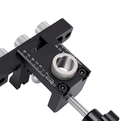 Close-up of Heavy Duty 3 In 1 Self Centering Dowel Jig Kit For Shop Ready Woodworking showing adjustable width and etched lines.