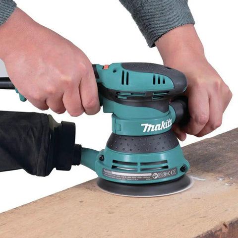 5 Inch Random Orbit Sander With 3 Amp Motor And Variable Speed Dial 4,000 To 12,000 OPM used on wood surface