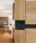 Beefy Heavy Duty Half Dummy Lever Matte Black Non Turning Interior Door Handle installed on wooden door for closets and pantries