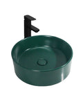 Bathroom Sink Bathroom Round Non-Porous Ceramic Wash Basin Dark Green Wash Basin with modern faucet for above counter use.