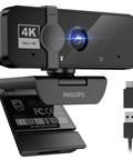 4K Webcam For PC With Built In Microphone, angled view showing USB connection and lens, ideal for streaming and video calls.
