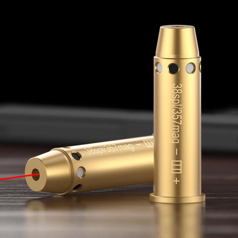 Brass Red Laser Bore Sight For.357 Magnum And.38 Special displaying laser output, compact design for quick zeroing.