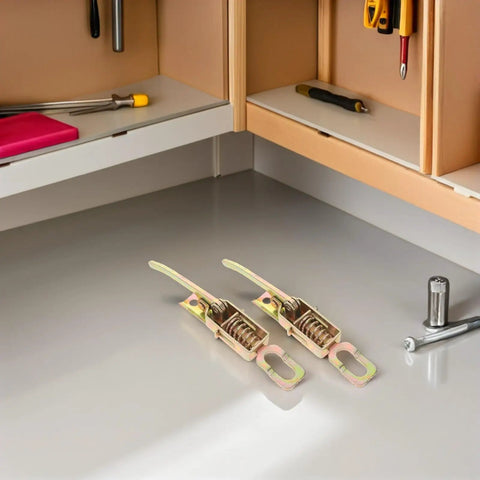Heavy Duty 2 Piece Spring Loaded Trailer Latch Set With Galvanized Build For Cargo And Dump Trucks on a workshop countertop.