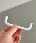 Bright White 3.8 Inch Cabinet Pulls 5 Pack Aluminum Alloy Drawer Handles for Cabinets and Drawers 96mm Hole Center held in hand