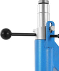 Close-up of blue metal structure with handle on Planishing Hammer 4 Inch Pneumatic Metal Shaping Machine With 875-1350 RPM.