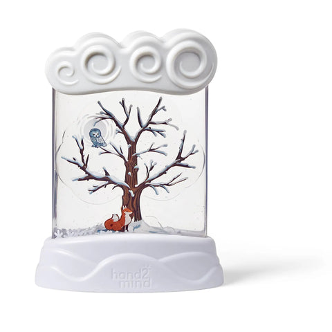 Winter Seasonal Sensory Tube for Calming Kids, tree design with snow for stress relief and anxiety relief in classrooms.