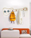 Modern Wall Mount Coat Hooks Dang Handy Entryway Storage Rack easily hangs jackets and bags on a decorative guitar-shaped rack.
