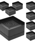 Eight Piece No Slip Furniture Pads For Table And Chair Legs Rubber And Polypropylene Floor Protectors shown in black color