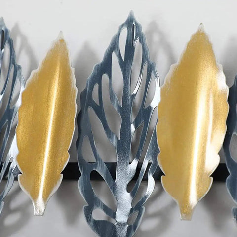 Kick Your Daily Clutter Aside With This Slick Wall Mounted Coat Rack Featuring Dang Sturdy Door Hooks That Handle Clothes Hats Robes And Towels Without Trouble Great For Busy Bathrooms Entryways Or Workspaces Anywhere You Keep Your Stuff Close. Decorative metal leaf accents in silver and gold on a wall mounted coat rack.