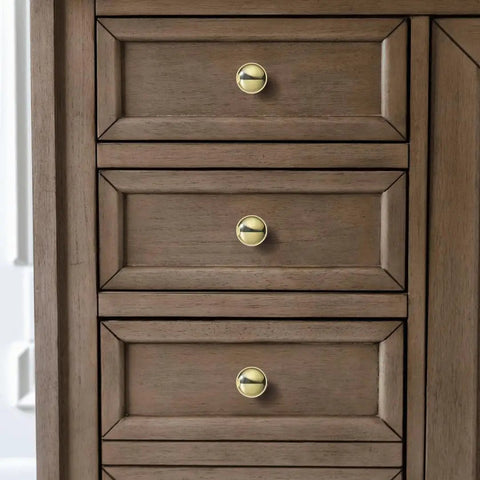 Close-up of 10 Pack Round Polished Brass Cabinet Knobs Smooth Zinc Drawer Handles For Kitchen Cupboard Furniture Hardware installed on drawers.