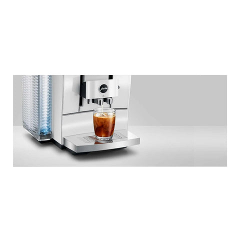 Slick Smart Fully Automatic Coffee Center With Dope Hot And Cold Brew Options Ai Powered Touchscreen Wifi App Control Integrated Grinder Diamond White Finish showcasing iced coffee in glass.