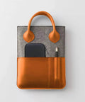 Heavy Duty Slick Daily Driver Travel Case For Macbook Adapters Type C Chargers And Tech Gear With Spacious Soft Interior For Hubs Mice And Cables Water Resistant PU Leather Black displayed with orange accents.