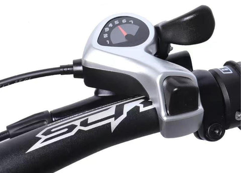 Close-up of Right Thumb Trigger Shifter For 7 Speed Bikes, SL-TX50-7R on black handlebar, smooth precise shifting control visible.