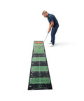Golfer practicing on a 10-foot golf putting training mat, classic green, with alignment aids and stroke rhythm tools for home simulation.