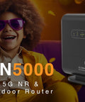 Ultra Fast 5G Indoor Router With WiFi 6 And Multi Port LAN For Home Or Small Office, VoNR And VoLTE Supported next to smiling child.