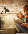 Gooseneck Desk Lamp with Wireless Charger and USB Port, 12W 1200 Lumens Eye Care LED Reading Light next to mother and child reading.