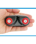 2 Pack Kayak Cam Cleats Aluminum Boat Cleats held in hand, featuring red and black scratch-resistant base for secure line grabbing