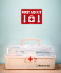 First Aid Kit wall decal sign, red vinyl 10 x 7 in with white arrows and cross