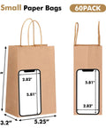 "60 Pack Small Brown Kraft Gift Bags With Handles 5.25 x 3.2 x 8 Inches Bulk For Gifts Shopping Birthday Wedding Party Favors And Handmade Treat Packaging Great For Party Favors Retail Bulk Craft Projects Wedding Favors Baby Shower Gifts And Stocking" showing size comparison with smartphone.