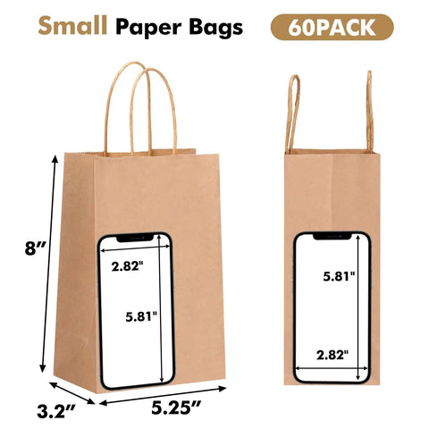 "60 Pack Small Brown Kraft Gift Bags With Handles 5.25 x 3.2 x 8 Inches Bulk For Gifts Shopping Birthday Wedding Party Favors And Handmade Treat Packaging Great For Party Favors Retail Bulk Craft Projects Wedding Favors Baby Shower Gifts And Stocking" showing size comparison with smartphone.