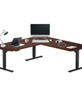 Massive 72 By 72 Inch L Shaped Corner Standing Desk With Smooth Electric Motor For Effortless Height Adjustments Built Different Heavy Duty Frame For Your Daily Home Office Grind, featuring dark cherry finish and accessories.