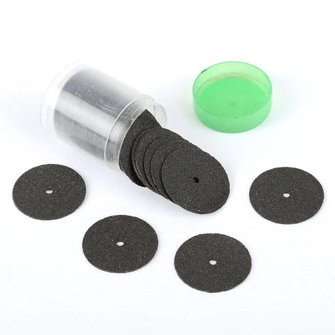 Badass 36 Piece Abrasive Cutting Discs And Slick Cut Off Wheels For Rotary Grinders with black cutting discs in container.