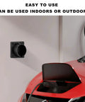 EV Charger Holder Wall Mount For SAE J1772 Connector installed indoors beside a red car, showing easy use.