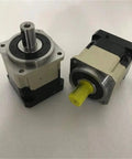 High Performance Hard Tooth Planetary Gear Reducer Delivering Rock Solid Torque Conversion And Absolute Zero Slop Action For Heavy Duty Speed Reduction Projects, showcasing two units with different shaft colors.