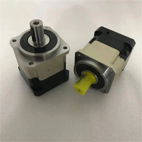 High Performance Hard Tooth Planetary Gear Reducer Delivering Rock Solid Torque Conversion And Absolute Zero Slop Action For Heavy Duty Speed Reduction Projects, showcasing two units with different shaft colors.