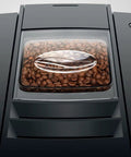 One-Touch Automatic Coffee Machine For Home Use With Five Barista Styles Including Espresso, Ristretto, Café Barista And Lungo Barista, Pulse Extraction Process, Conical Burr, Sleek Black Finish showing bean hopper.