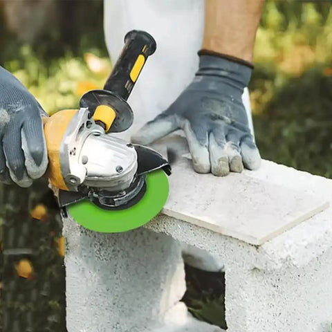 Person using Ultra-Thin 4.5 Inch Glass Cutting Disc Diamond Blade For Angle Grinder on tile outdoors
