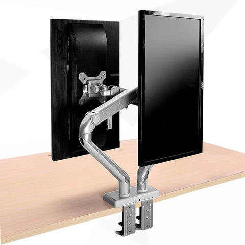 Rock Solid Dual Monitor Arms For 17 To 32 Inch Screens With Mechanical Spring Tension and Smooth Glide Aluminum Stand on a desk.