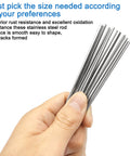Hand holding 30 Piece Stainless Steel Round Rod Set In Six Sizes 1mm 1.5mm 2mm 2.5mm 3mm And 4mm 100mm Length 304 Stainless Steel Metal Rods For Industry Metalworking Pros Hobbyists And DIYers
