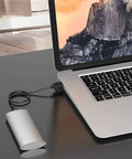 Slick Aluminum M.2 To Type C Enclosure For B Key Ssd Up To 2tb Fast Usb 3.1 Docking Station connected to laptop.