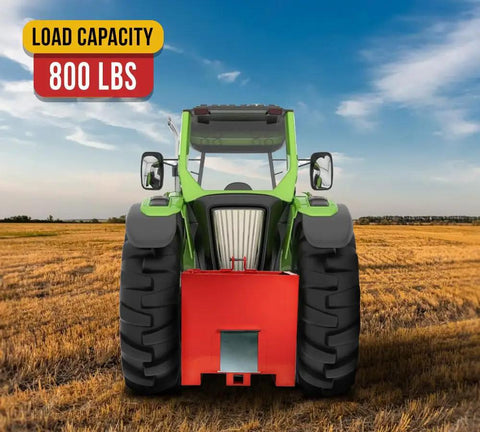 Front view of a green tractor with red Beefy 3 Point Hitch Tractor Ballast Box With 800 Lbs Capacity on a field