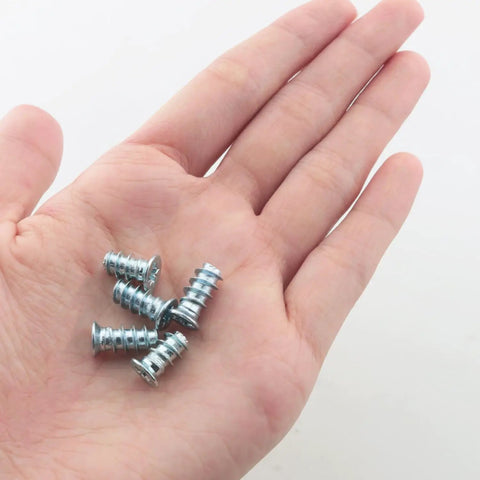 Heavy Duty 24 Pack Phillips Head Drawer Slide Replacement Screws No Sweat Self Tapping Hardware for Chest Of Drawers And Cabinetry Repair, showing five screws in a hand.