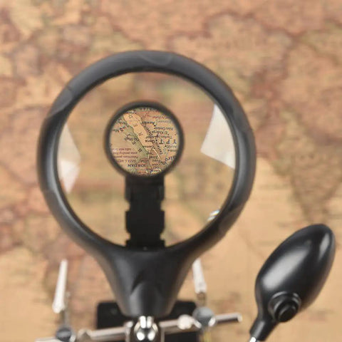 LED Light Magnifier Desk Lamp With 2.5X, 7.5X And 10X Lenses showing map details on magnifying glass