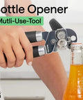 Person using Heavy Duty Stainless Steel Smooth Edge Manual Can Opener And Bottle Opener With Oversized Handheld Turn Knob