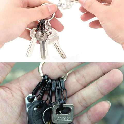 Hands holding keychains with 30 Piece Mini Carabiner Clip Set, Tiny Zinc Alloy Spring Snap Hooks For Keychains, Backpacks, Camping