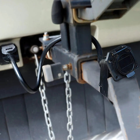 Top Shelf 3 Foot 7 Way Trailer Plug Socket Extension Cable With Heavy Duty Double Prong Copper Terminals connected to trailer hitch.